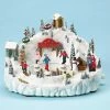 The Holiday Barn Skating Pond Music Box Christmas Music Boxes